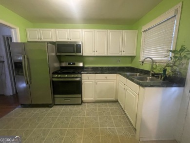 Check out this charming 3 bedroom, 1 bath bungalow in Decatur on East Lake Golf Club in Georgia - for sale on GolfHomes.com, golf home, golf lot