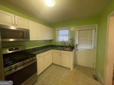 Check out this charming 3 bedroom, 1 bath bungalow in Decatur on East Lake Golf Club in Georgia - for sale on GolfHomes.com, golf home, golf lot