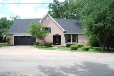 4 BR 2.5 bath home nestled on .55 acres (2 lots) surrounded by on White Bluff Resort - New Course in Texas - for sale on GolfHomes.com, golf home, golf lot