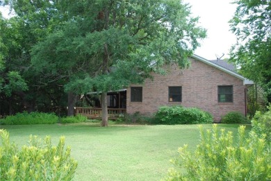 4 BR 2.5 bath home nestled on .55 acres (2 lots) surrounded by on White Bluff Resort - New Course in Texas - for sale on GolfHomes.com, golf home, golf lot