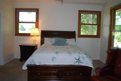 4 BR 2.5 bath home nestled on .55 acres (2 lots) surrounded by on White Bluff Resort - New Course in Texas - for sale on GolfHomes.com, golf home, golf lot