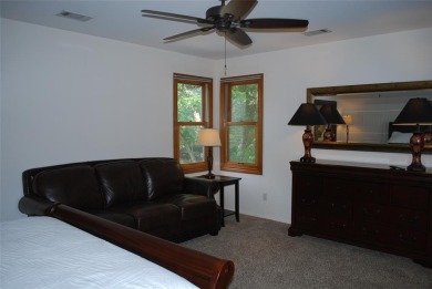 4 BR 2.5 bath home nestled on .55 acres (2 lots) surrounded by on White Bluff Resort - New Course in Texas - for sale on GolfHomes.com, golf home, golf lot
