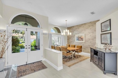 Welcome to refined living in one of the area's most desired on River Wilderness Golf and Country Club in Florida - for sale on GolfHomes.com, golf home, golf lot