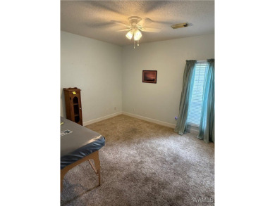Live on the 15th fairway of Tall Pines Golf Club! This 3BR/2BA on Woodland Forrest Country Club in Alabama - for sale on GolfHomes.com, golf home, golf lot