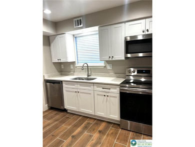 Welcome to this completely remodeled ranch-style condo located on Brookside Country Club in Pennsylvania - for sale on GolfHomes.com, golf home, golf lot