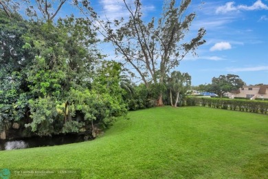 ALL IMPACT WINDOWS, BEAUTIFUL STAINLESS APPLIANCES WASHER DRYER on Oriole Golf and Tennis Club in Florida - for sale on GolfHomes.com, golf home, golf lot