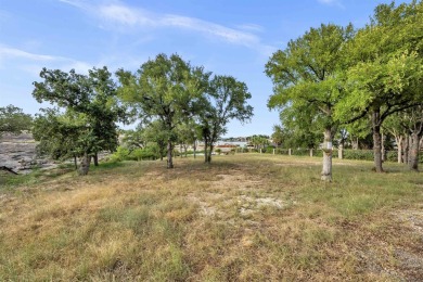 Discover your perfect lakefront escape on the controlled-level on Apple Rock Golf Course - Horseshoe Bay in Texas - for sale on GolfHomes.com, golf home, golf lot