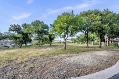 Discover your perfect lakefront escape on the controlled-level on Apple Rock Golf Course - Horseshoe Bay in Texas - for sale on GolfHomes.com, golf home, golf lot