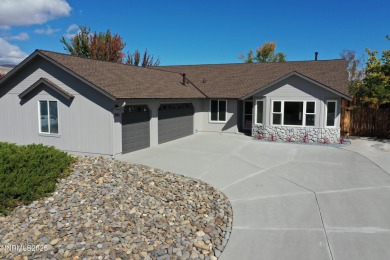 Beautifully Updated Indian Hills Gem! Perfectly situated on a on Sun Ridge Golf Course in Nevada - for sale on GolfHomes.com, golf home, golf lot