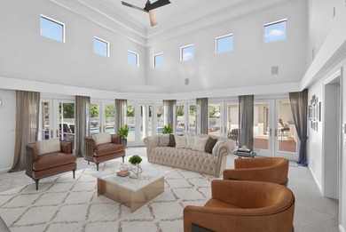 Set on 1.25 acres directly across from PGA National, this estate on  in Florida - for sale on GolfHomes.com, golf home, golf lot