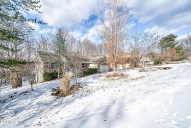 Nestled in the heart of Fairfield Glade North, this 2006-built on Heatherhurst Golf Course in Tennessee - for sale on GolfHomes.com, golf home, golf lot