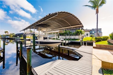 Welcome to paradise in Southwest Cape Coral! This luxurious on Royal Tee Country Club in Florida - for sale on GolfHomes.com, golf home, golf lot