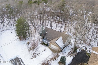 Nestled in the heart of Fairfield Glade North, this 2006-built on Heatherhurst Golf Course in Tennessee - for sale on GolfHomes.com, golf home, golf lot