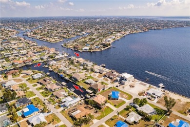 Welcome to paradise in Southwest Cape Coral! This luxurious on Royal Tee Country Club in Florida - for sale on GolfHomes.com, golf home, golf lot