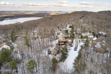 Nestled in the heart of Fairfield Glade North, this 2006-built on Heatherhurst Golf Course in Tennessee - for sale on GolfHomes.com, golf home, golf lot