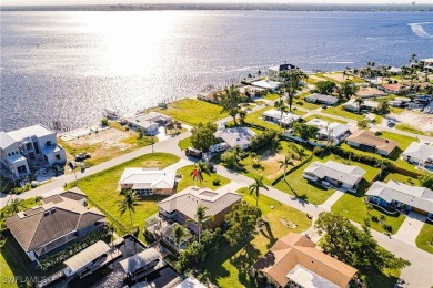 Welcome to paradise in Southwest Cape Coral! This luxurious on Royal Tee Country Club in Florida - for sale on GolfHomes.com, golf home, golf lot