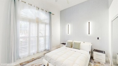 This lovely home, redesigned to be a peaceful retreat, is just a on The Wanderers Club in Florida - for sale on GolfHomes.com, golf home, golf lot