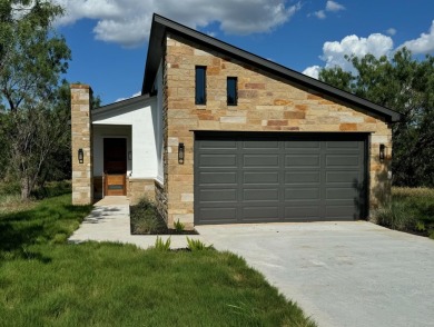 Make this house your home!. This stucco and stone new on Escondido Golf and Lake Club  in Texas - for sale on GolfHomes.com, golf home, golf lot