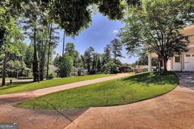 HIGHLY MOTIVATED SELLER! Welcome to the epitome of luxury living on College Park Municipal Golf Course in Georgia - for sale on GolfHomes.com, golf home, golf lot