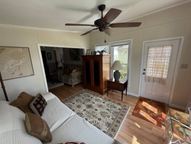 This well-cared for 2-bedroom, 2-bathroom home is being sold on Del Tura Golf and Country Club in Florida - for sale on GolfHomes.com, golf home, golf lot