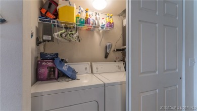 Located in a park like setting, this 2 br 2 bath condo at the on Lake Valley Country Club in Missouri - for sale on GolfHomes.com, golf home, golf lot