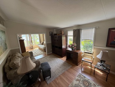 This well-cared for 2-bedroom, 2-bathroom home is being sold on Del Tura Golf and Country Club in Florida - for sale on GolfHomes.com, golf home, golf lot