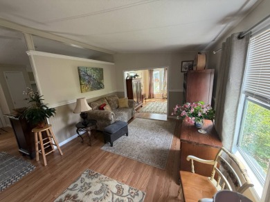 This well-cared for 2-bedroom, 2-bathroom home is being sold on Del Tura Golf and Country Club in Florida - for sale on GolfHomes.com, golf home, golf lot