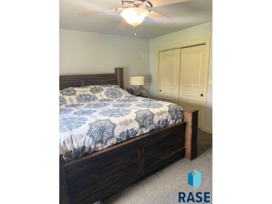 Step into this spacious 5 bedroom home offering an open floor on Wild Oak Golf Club in South Dakota - for sale on GolfHomes.com, golf home, golf lot