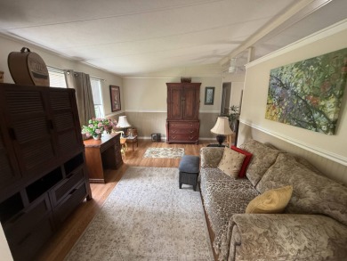 This well-cared for 2-bedroom, 2-bathroom home is being sold on Del Tura Golf and Country Club in Florida - for sale on GolfHomes.com, golf home, golf lot
