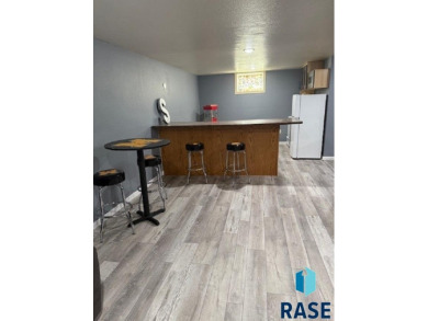 Step into this spacious 5 bedroom home offering an open floor on Wild Oak Golf Club in South Dakota - for sale on GolfHomes.com, golf home, golf lot