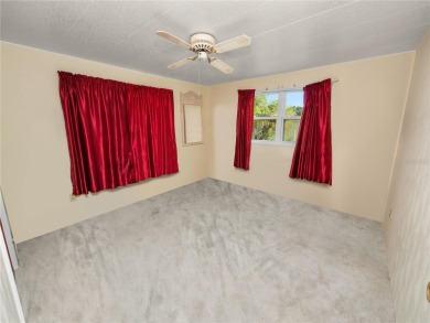 PRICE REDUCED!!! Welcome home to this spacious 2-bedroom on Wedgewood Golf Club in Florida - for sale on GolfHomes.com, golf home, golf lot