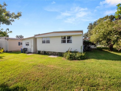 PRICE REDUCED!!! Welcome home to this spacious 2-bedroom on Wedgewood Golf Club in Florida - for sale on GolfHomes.com, golf home, golf lot