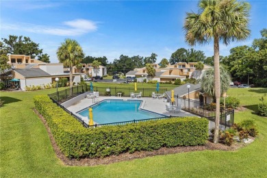 Welcome to this beautiful and light-filled 2-bedroom, 2-bathroom on Mount Dora Golf Club in Florida - for sale on GolfHomes.com, golf home, golf lot