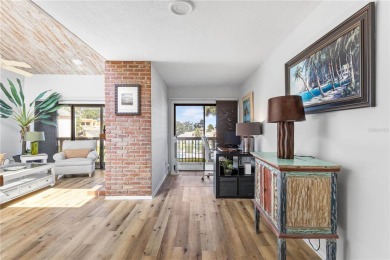 Welcome to this beautiful and light-filled 2-bedroom, 2-bathroom on Mount Dora Golf Club in Florida - for sale on GolfHomes.com, golf home, golf lot