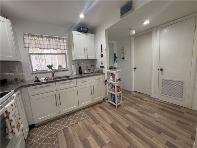 Beautiful corner unit  1/1/.5 condo in this 55+ community  with on Sunrise Lakes Phase III in Florida - for sale on GolfHomes.com, golf home, golf lot