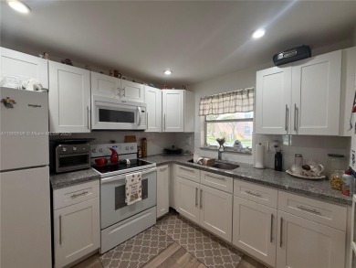 Beautiful corner unit  1/1/.5 condo in this 55+ community  with on Sunrise Lakes Phase III in Florida - for sale on GolfHomes.com, golf home, golf lot