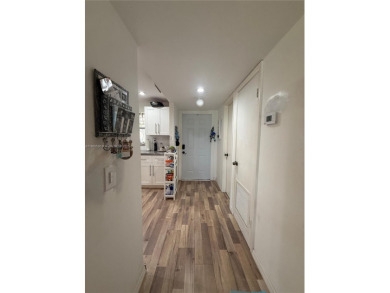 Beautiful corner unit  1/1/.5 condo in this 55+ community  with on Sunrise Lakes Phase III in Florida - for sale on GolfHomes.com, golf home, golf lot