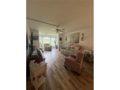 Beautiful corner unit  1/1/.5 condo in this 55+ community  with on Sunrise Lakes Phase III in Florida - for sale on GolfHomes.com, golf home, golf lot