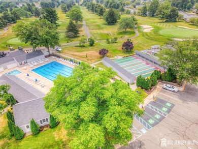 Welcome to Rossmoor! This inviting two-bedroom, two-bath on Rossmoor Golf Club in New Jersey - for sale on GolfHomes.com, golf home, golf lot