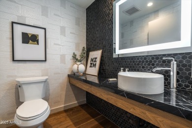Discover refined living in this rare 2-bedroom, 2.5-bathroom on Mountain Shadows Executive Golf Course in Arizona - for sale on GolfHomes.com, golf home, golf lot