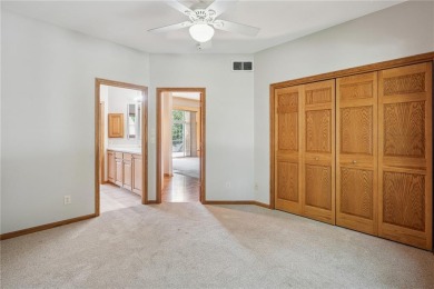 Welcome to a home where elegance meets everyday comfort on Brown Deer Golf Club in Iowa - for sale on GolfHomes.com, golf home, golf lot