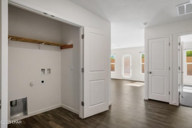 Discover this immaculate, nearly new home in Bullhead City's on Chaparral Golf and Country Club in Arizona - for sale on GolfHomes.com, golf home, golf lot