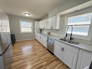 Your new home is a charming ranch nestled in a great on Currie Park Golf Club in Wisconsin - for sale on GolfHomes.com, golf home, golf lot