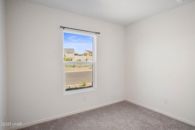 Discover this immaculate, nearly new home in Bullhead City's on Chaparral Golf and Country Club in Arizona - for sale on GolfHomes.com, golf home, golf lot