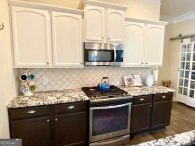 Welcome to 9602 Coastal Pointe Drive, a Fabulous, well cared for on Mirror Lake Golf Club in Georgia - for sale on GolfHomes.com, golf home, golf lot