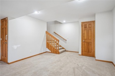 Welcome to a home where elegance meets everyday comfort on Brown Deer Golf Club in Iowa - for sale on GolfHomes.com, golf home, golf lot
