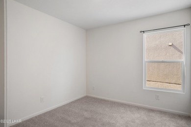 Discover this immaculate, nearly new home in Bullhead City's on Chaparral Golf and Country Club in Arizona - for sale on GolfHomes.com, golf home, golf lot