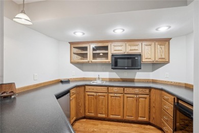 Welcome to a home where elegance meets everyday comfort on Brown Deer Golf Club in Iowa - for sale on GolfHomes.com, golf home, golf lot