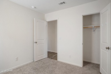 Discover this immaculate, nearly new home in Bullhead City's on Chaparral Golf and Country Club in Arizona - for sale on GolfHomes.com, golf home, golf lot