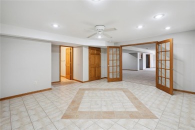 Welcome to a home where elegance meets everyday comfort on Brown Deer Golf Club in Iowa - for sale on GolfHomes.com, golf home, golf lot